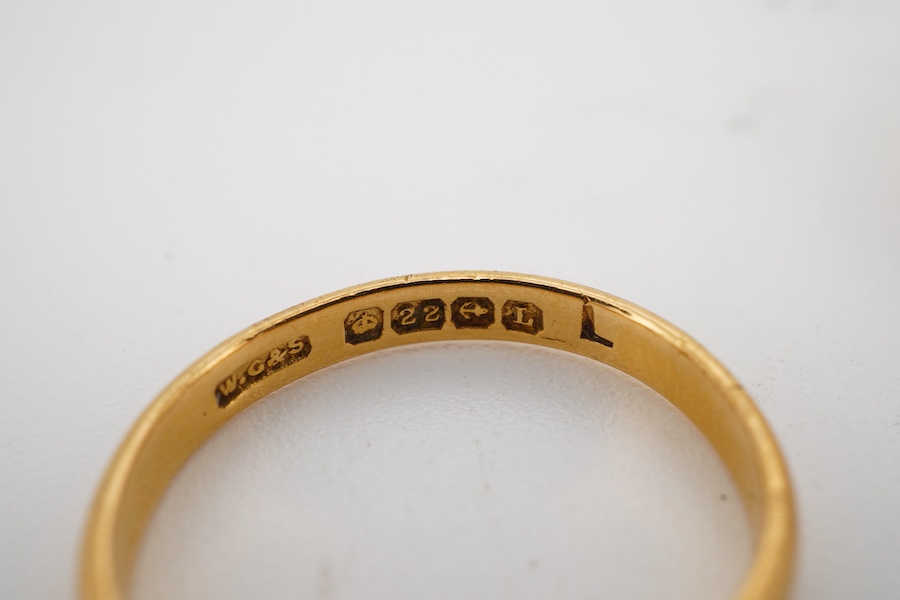 Two 22ct gold wedding bands, one 2.5mm, size K1/2, the other 6mm, size P, each with British hallmarks, combined gross weight approximately 6.5 grams